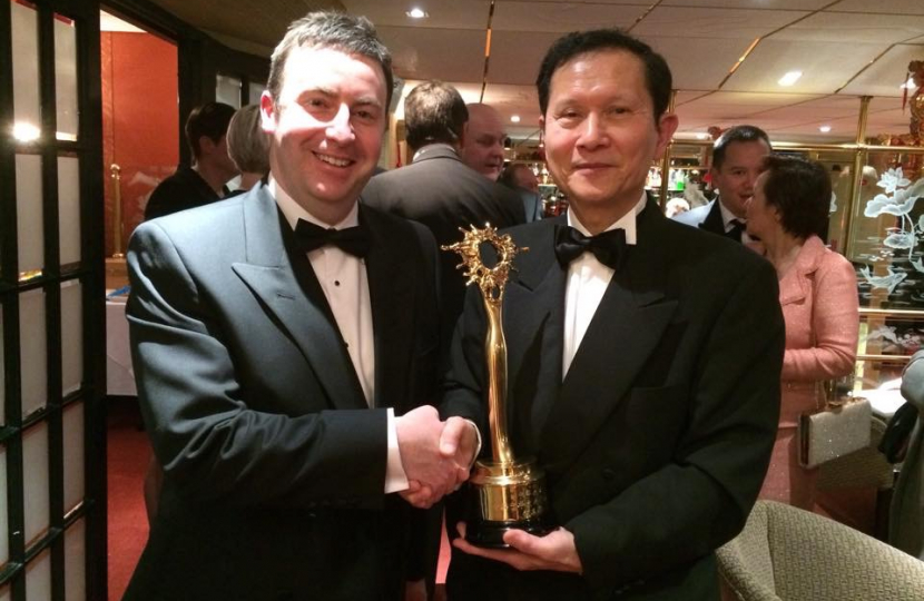 Stephen Bates with Mr Hung Ng MBE