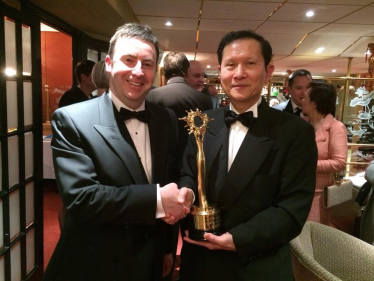 Stephen Bates with Mr Hung Ng MBE